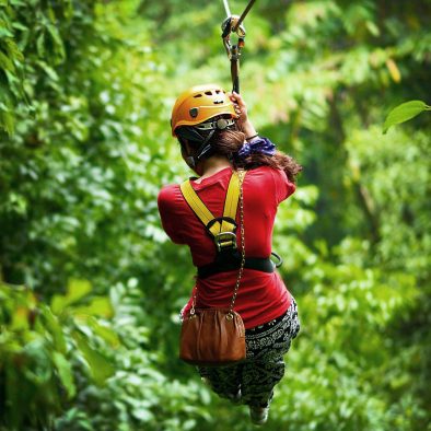 Woman ziplining